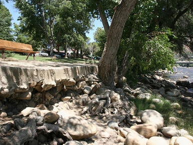 Degraded Riverside Park riverbank before restoration work